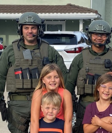Picture of Police Officers and kids
